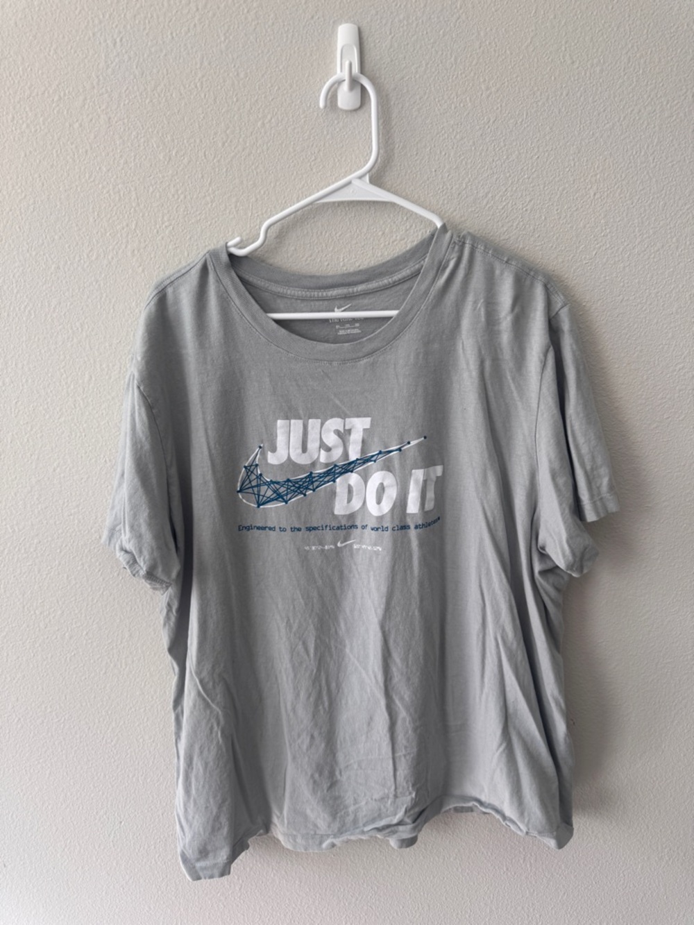 Nike Light Gray 'Just Do It' Graphic Tee with Blue Swoosh